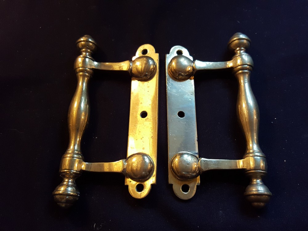 pair of brass victorian sash lifts