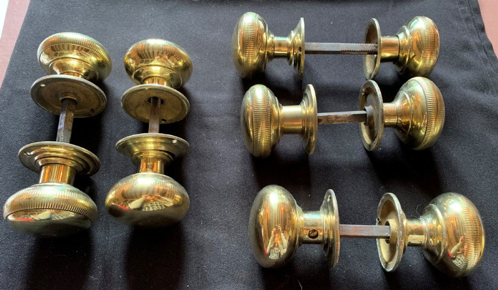 five pairs of brass victorian door knobs